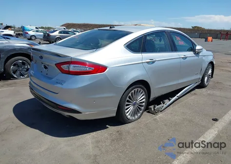2013 Ford Fusion Hybrid Titanium из США, поврежденный, VIN 3FA6P0RUXDR388796